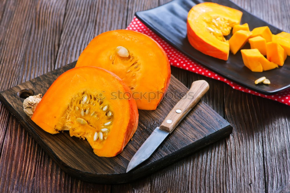 Similar – Piece of raw pumpkin