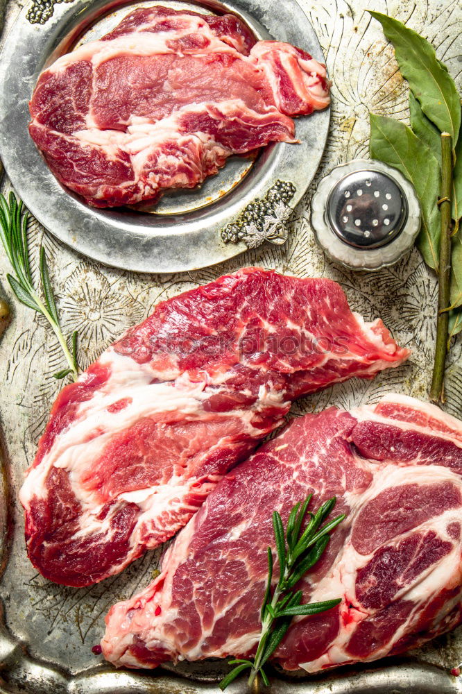 Image, Stock Photo Lamb cutlet with oil and rosemary