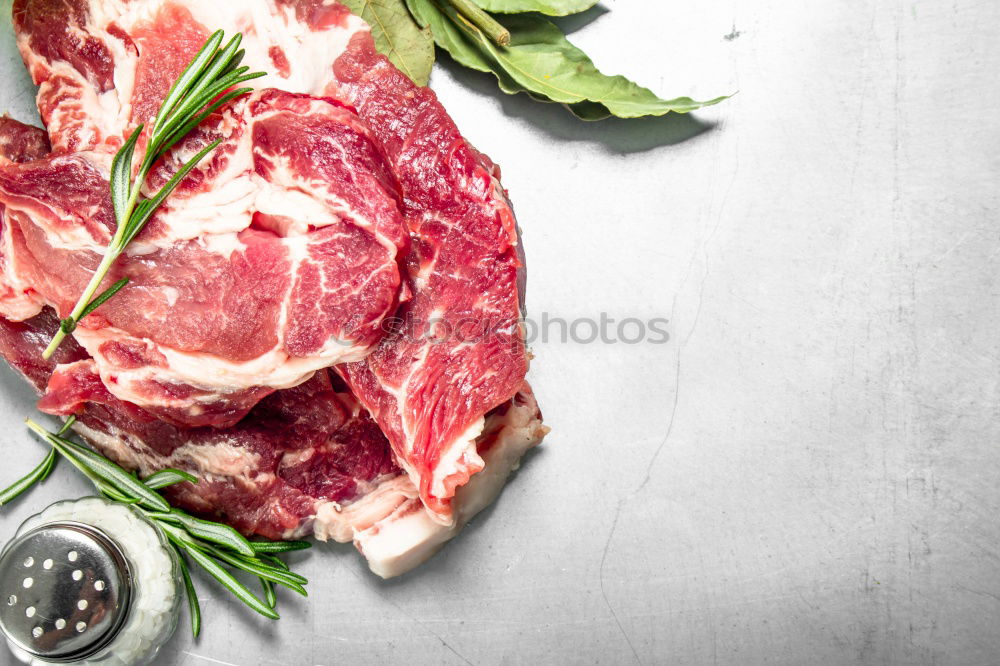 Similar – Image, Stock Photo Lamb cutlet with oil and rosemary