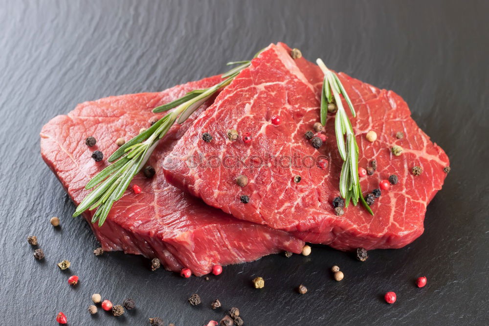 Similar – Image, Stock Photo Prepare steaks with herbs and butter