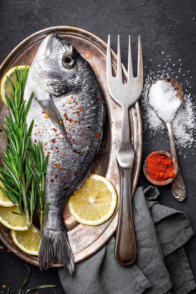 Similar – Image, Stock Photo Fish fillets with kitchen knife and spices