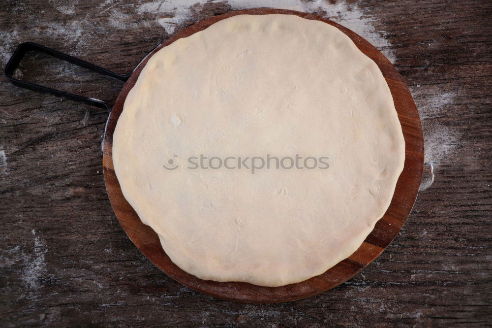 Similar – yeast dough in a ceramic plate