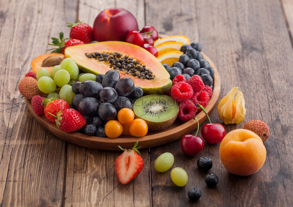 Mixed fruits on a rustic wooden table