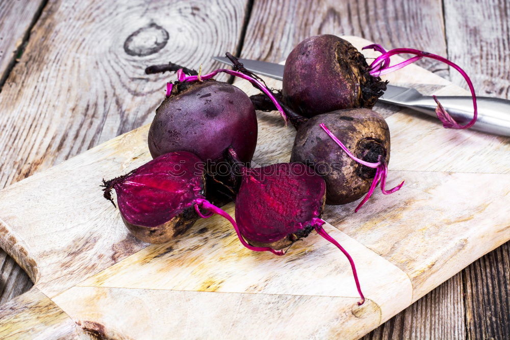 Similar – Red onion vegetable on the gray wooden surface