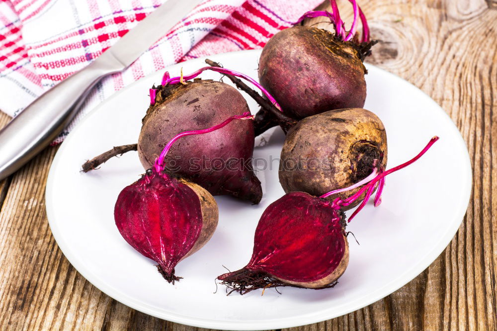 Similar – Red onion vegetable on the gray wooden surface