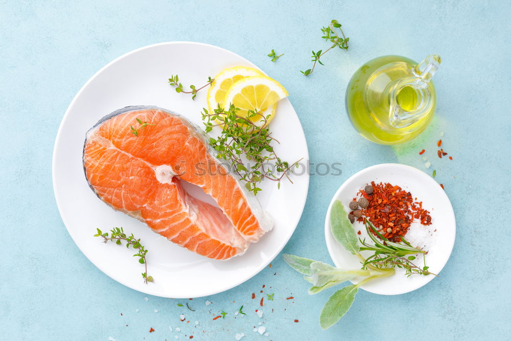 Similar – Image, Stock Photo Salmon fillet in pan with oil, lemon and dill