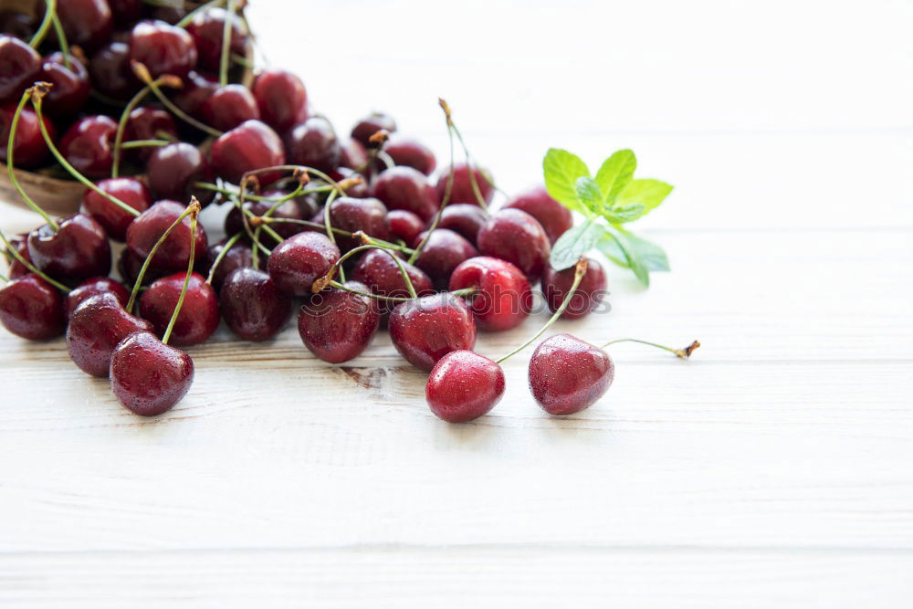 Similar – Image, Stock Photo Red grapes on an old wooden table close up