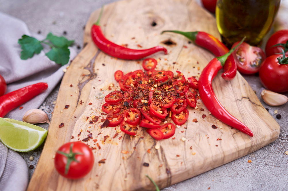 Similar – Image, Stock Photo Colourful chillies and spices on a white wooden table