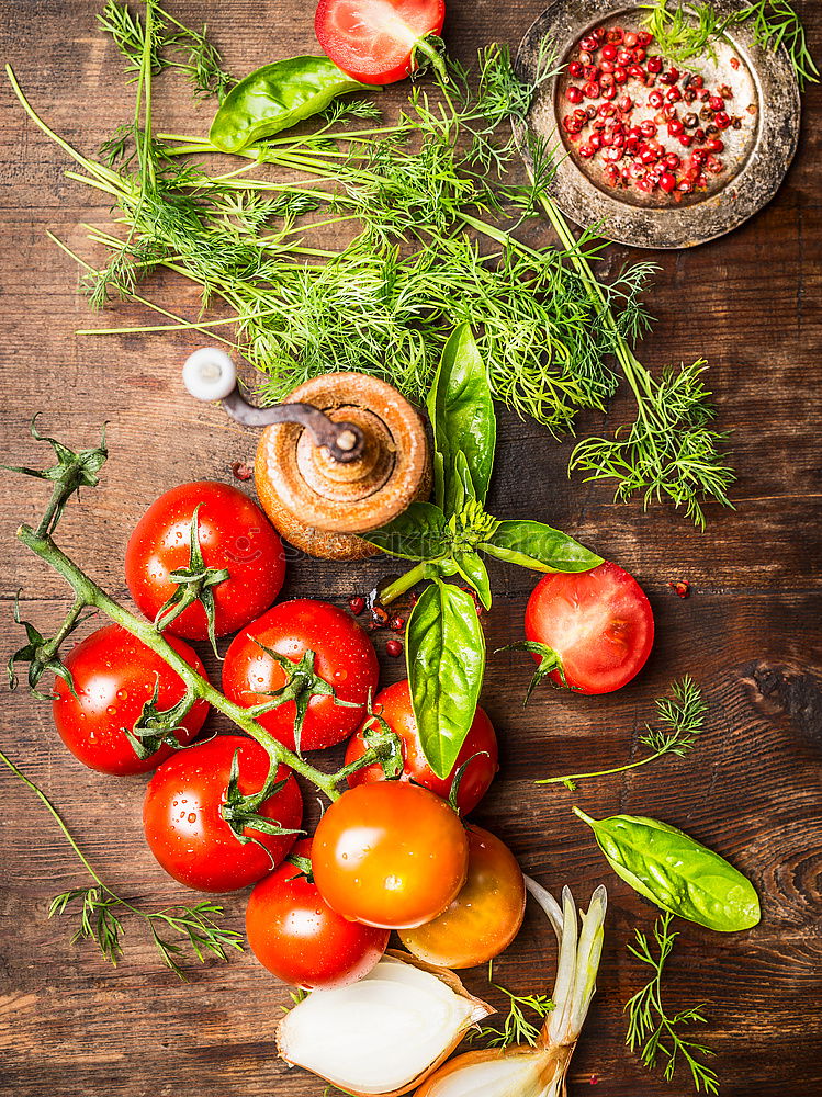 Fresh red tomatoes with herbs