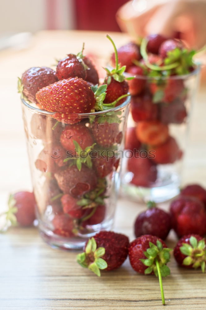 Similar – Fresh yogurt with fruits and muesli on breakfast