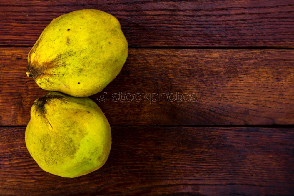 Similar – Image, Stock Photo fresh ripe yellow pears on a brown wooden table
