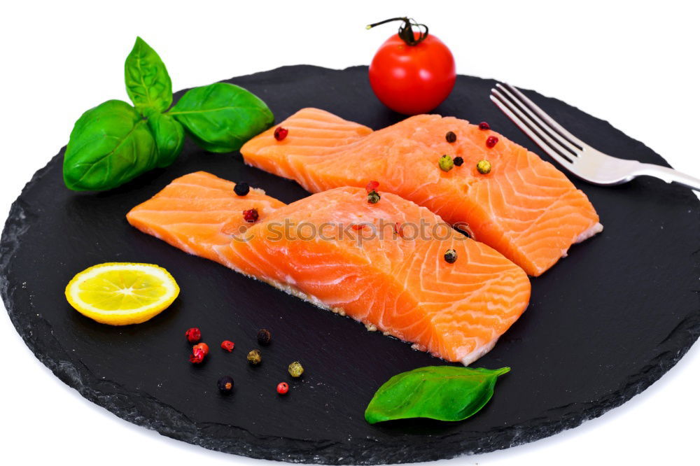 Similar – Salmon fish fillet with lemon in bowl