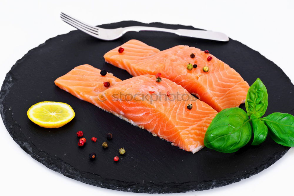 Similar – Salmon fish fillet with lemon in bowl