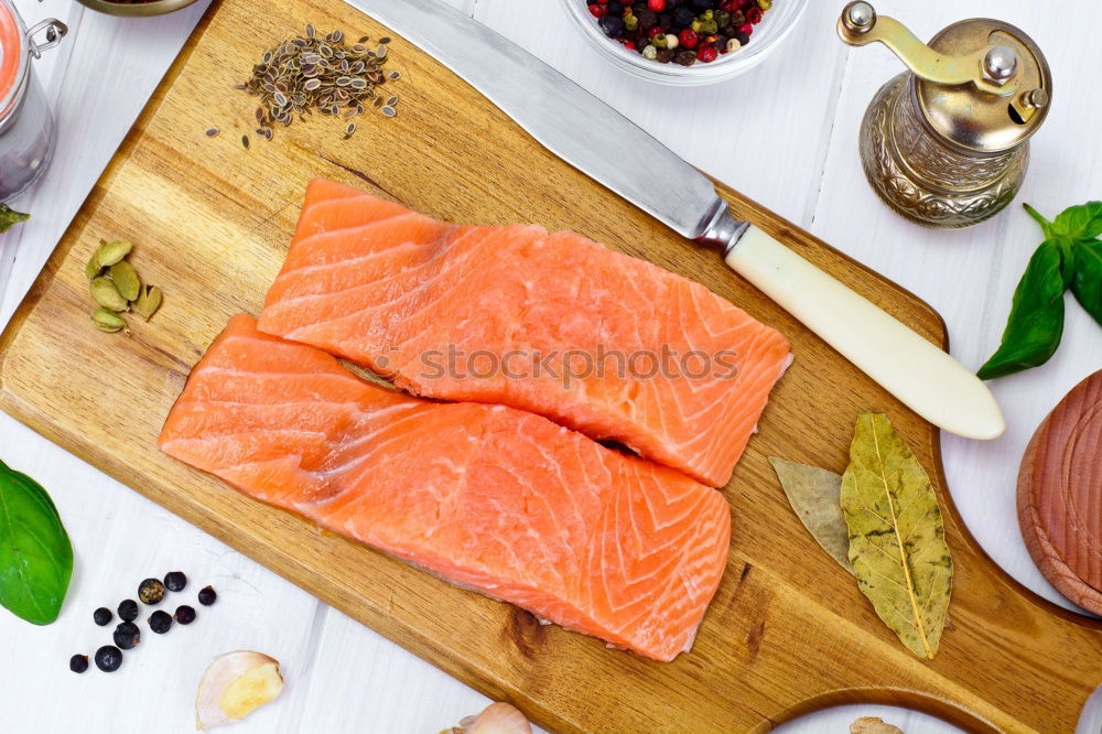 Similar – Image, Stock Photo Raw salmon with lemon and spices