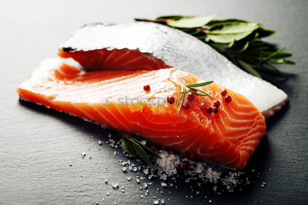 Similar – Image, Stock Photo Salmon fish fillet with lemon on white chopping board