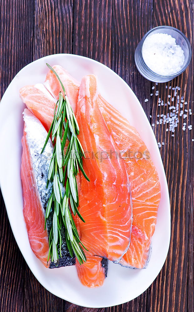 Similar – Salmon fish fillet with lemon in bowl