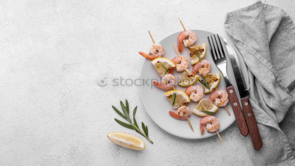 Similar – Various seafood on a blue background