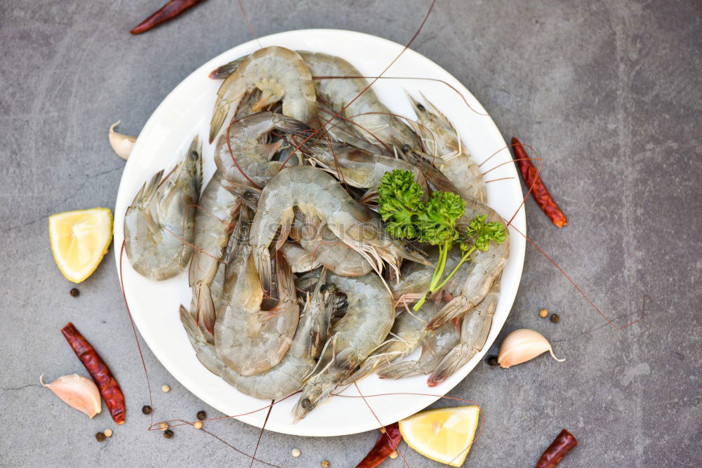 Similar – Foto Bild Rohe MiesMuscheln mit Tomaten und Gewürzen auf Schiefer