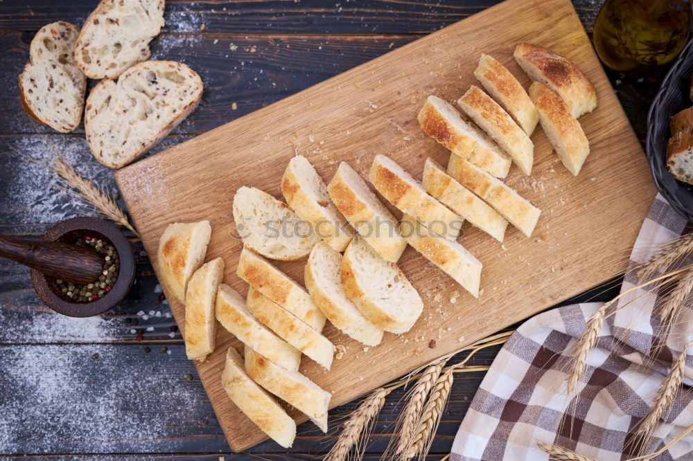 Similar – Image, Stock Photo Baguette with olives, garlic and cheese