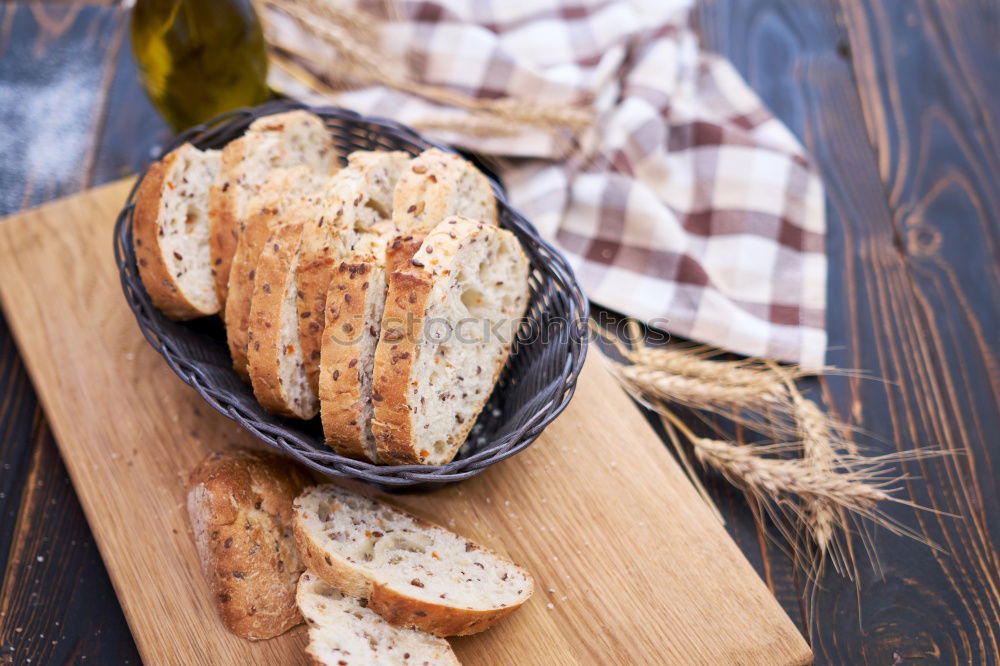 Similar – Image, Stock Photo Baguette with olives, garlic and cheese