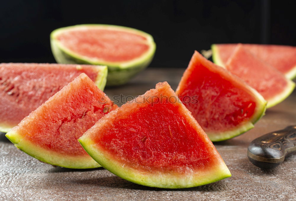 Similar – Half of the watermelon