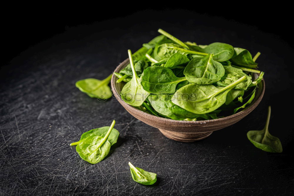 spinach in a round cast-iron frying pan