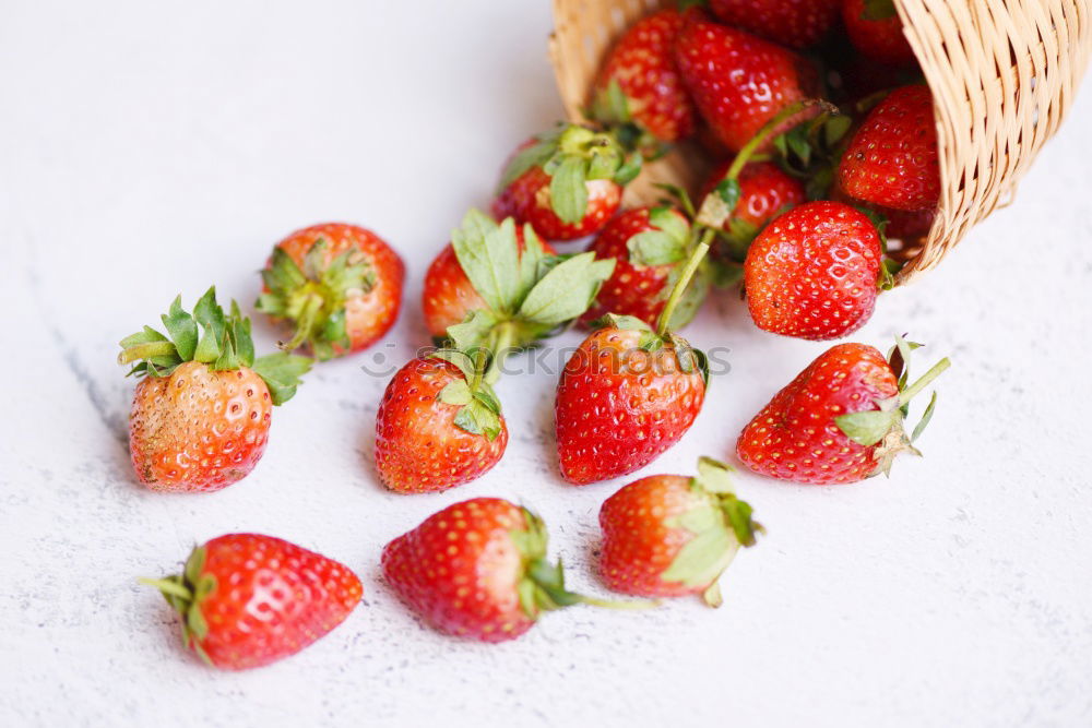 Similar – Strawberries in a bucket on a white wooden table