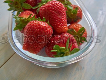 Similar – Strawberries close up on a white wooden table