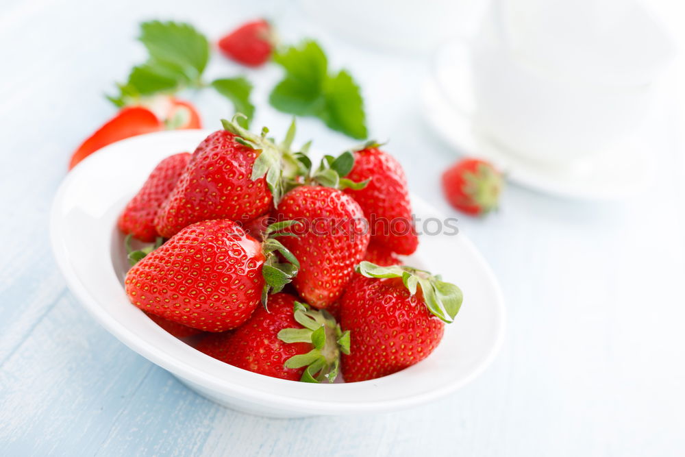 Similar – Strawberries in a bucket on a white wooden table