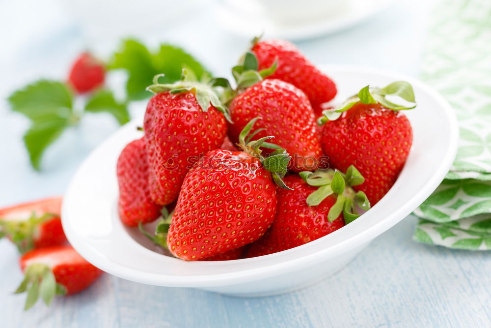 Similar – Strawberries in a bowl on an old wooden table