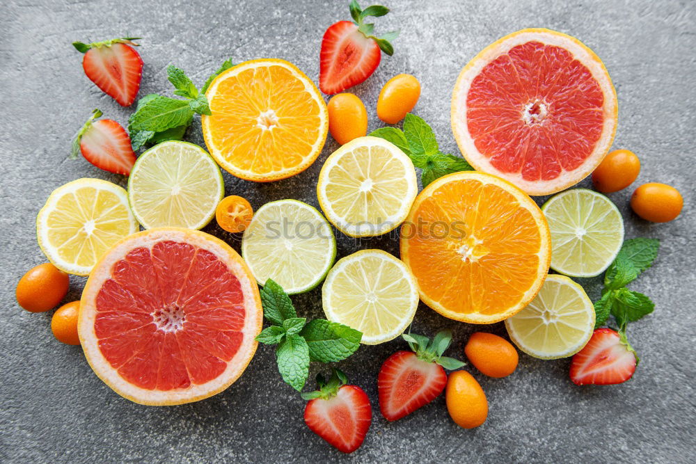 Similar – Image, Stock Photo Various citrus fruits on a light blue background