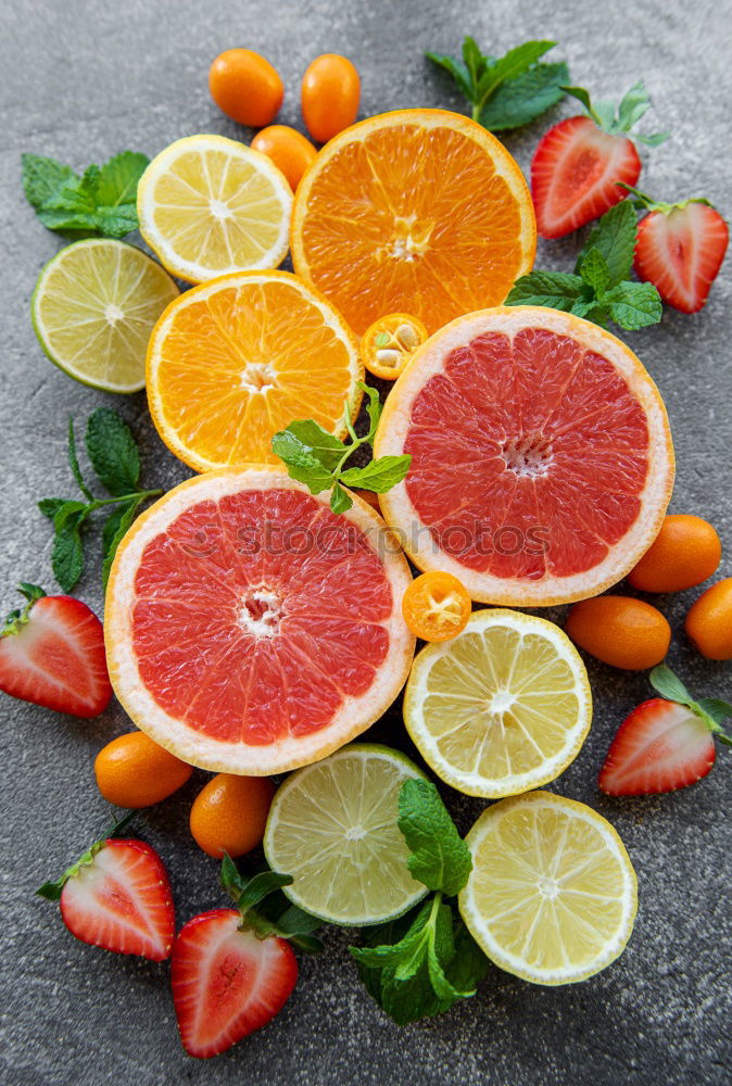 Similar – Image, Stock Photo Various citrus fruits on a light blue background