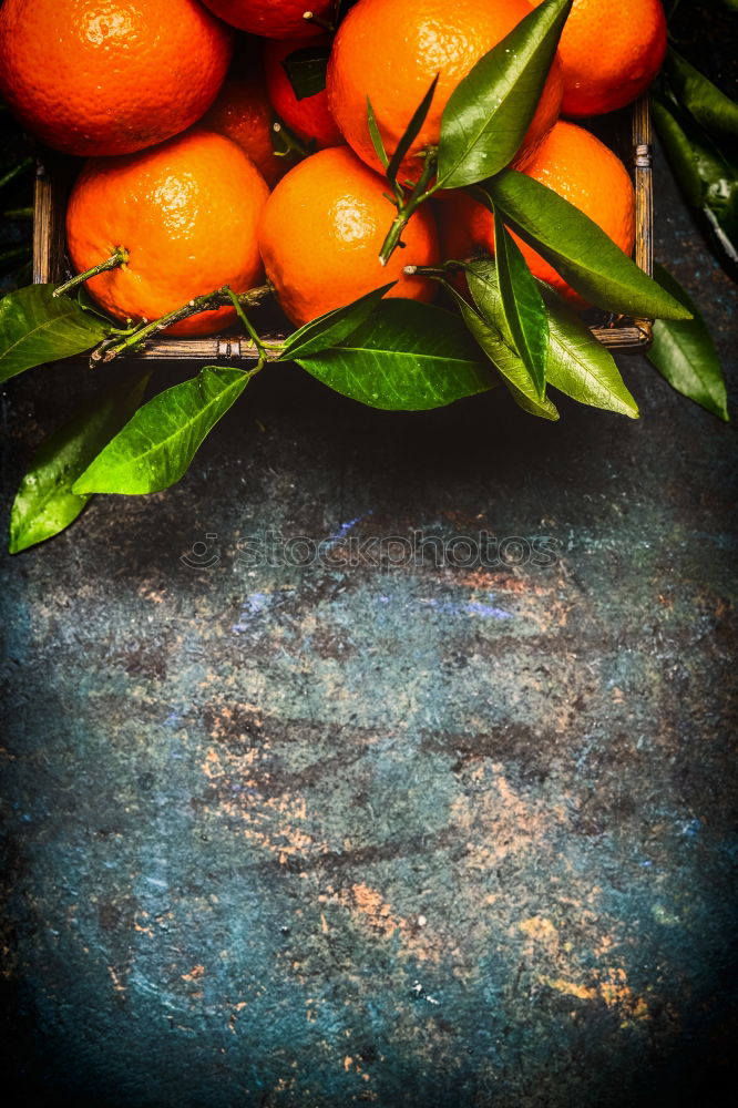 Image, Stock Photo Fresh mandarins with green leaves