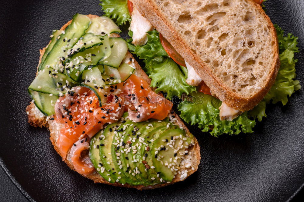 Similar – Image, Stock Photo Healthy fish sandwich with cornbread and matjes