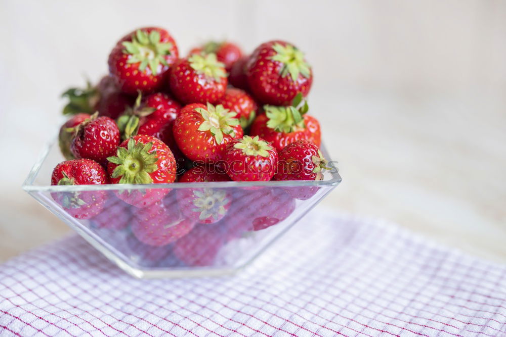 Similar – Strawberries in a bucket on a white wooden table