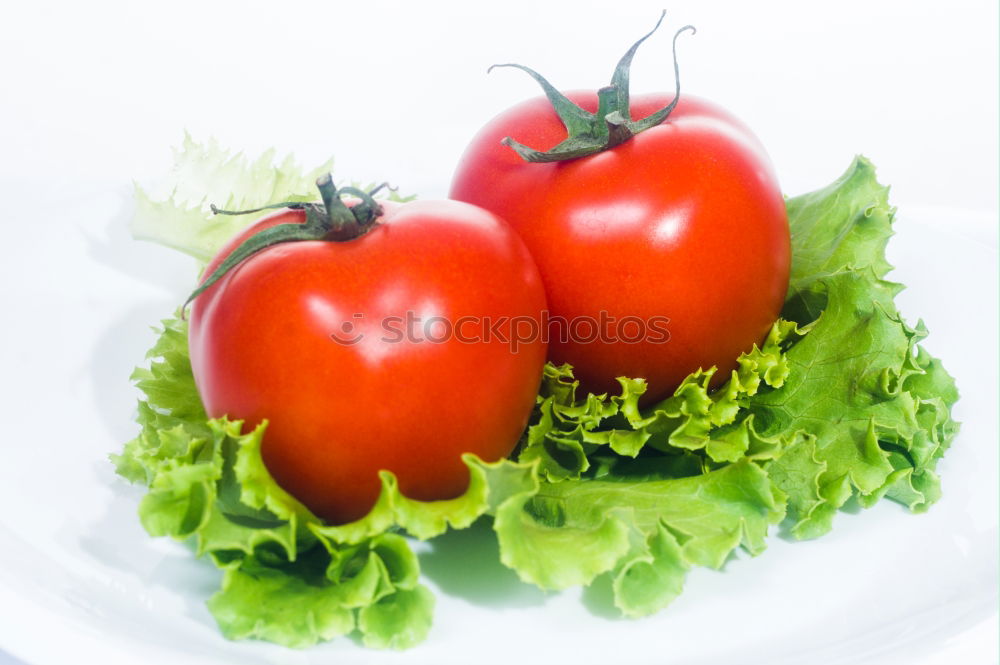 Similar – Fresh tomatoes in a green plate