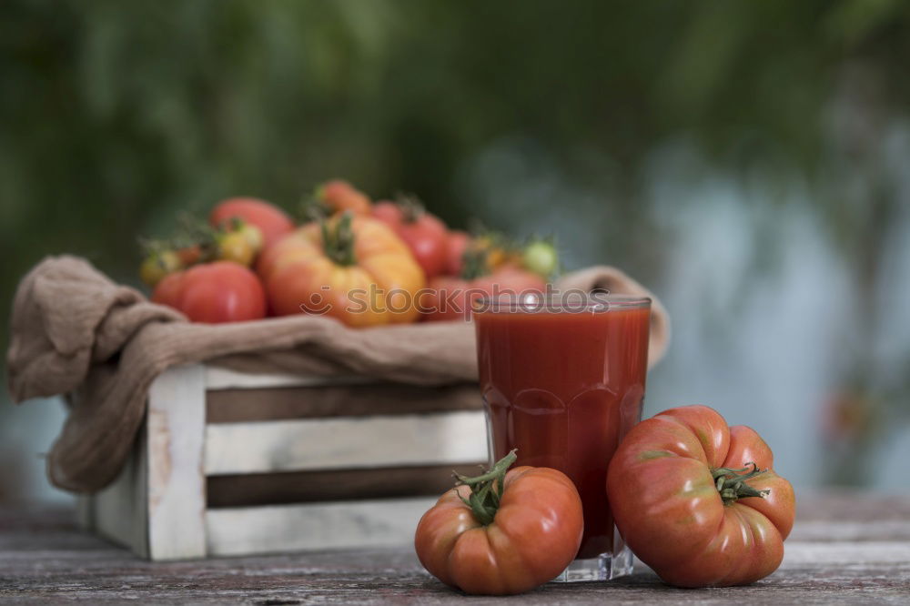 Similar – Juice from carrots, onions and spices in a glass jar