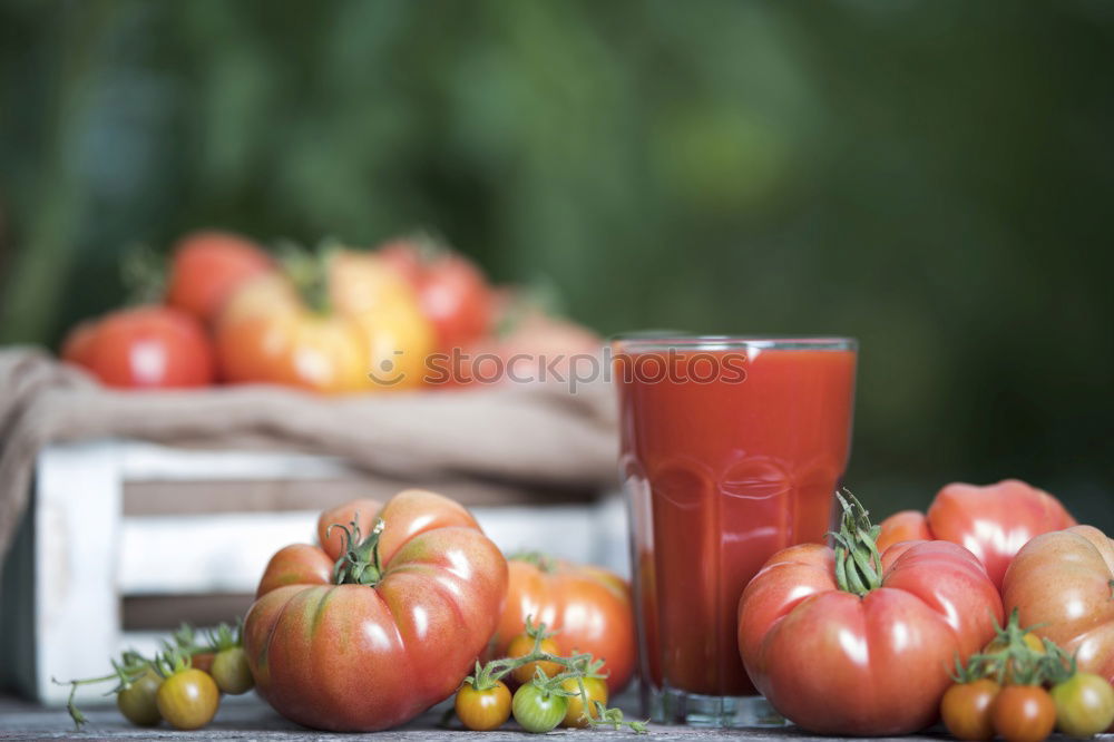 Similar – Juice from carrots, onions and spices in a glass jar