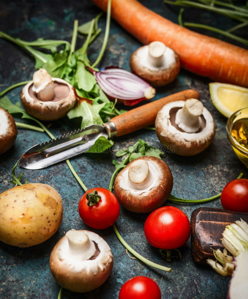 Fresh vegetables and vegetable peeler