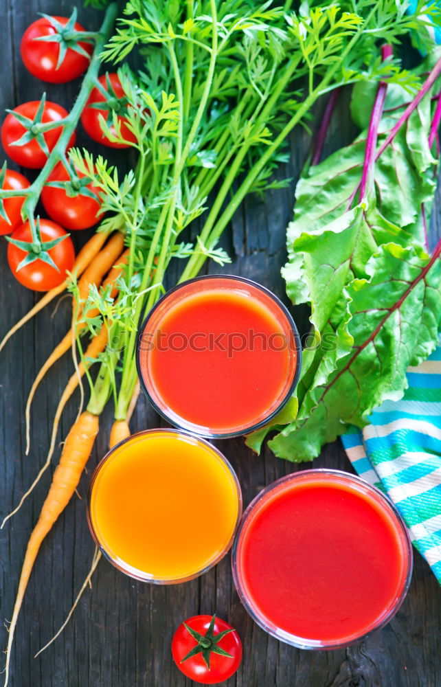 Similar – Carrot juice in a transparent little jar