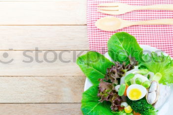 Similar – Empty plates and ingredients for spinach dishes