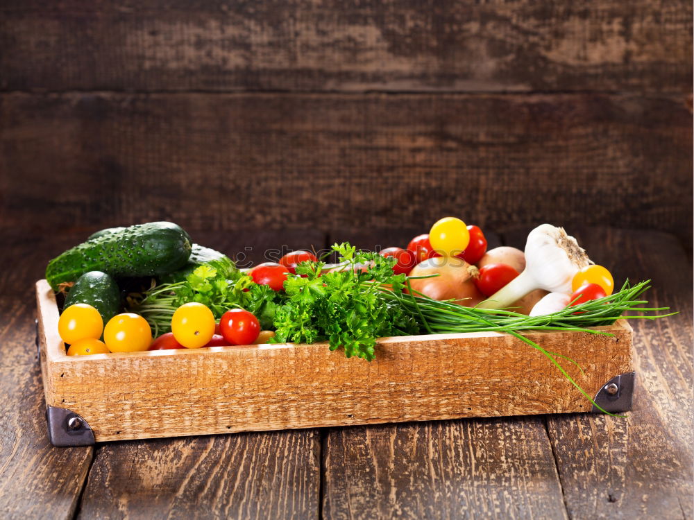 Similar – Vegetables and utensils on kitchen table