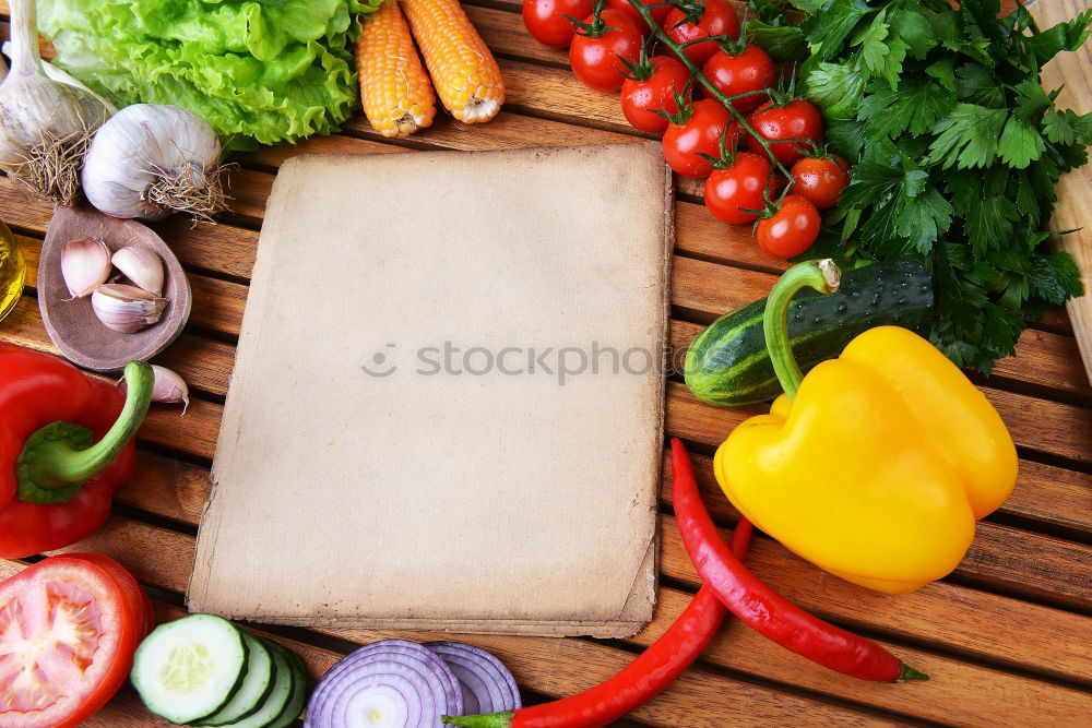 Similar – Vegetables and utensils on kitchen table