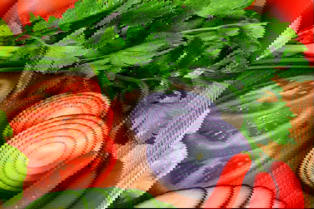 Similar – Image, Stock Photo Tomato and cucumber salad on a kitchen board