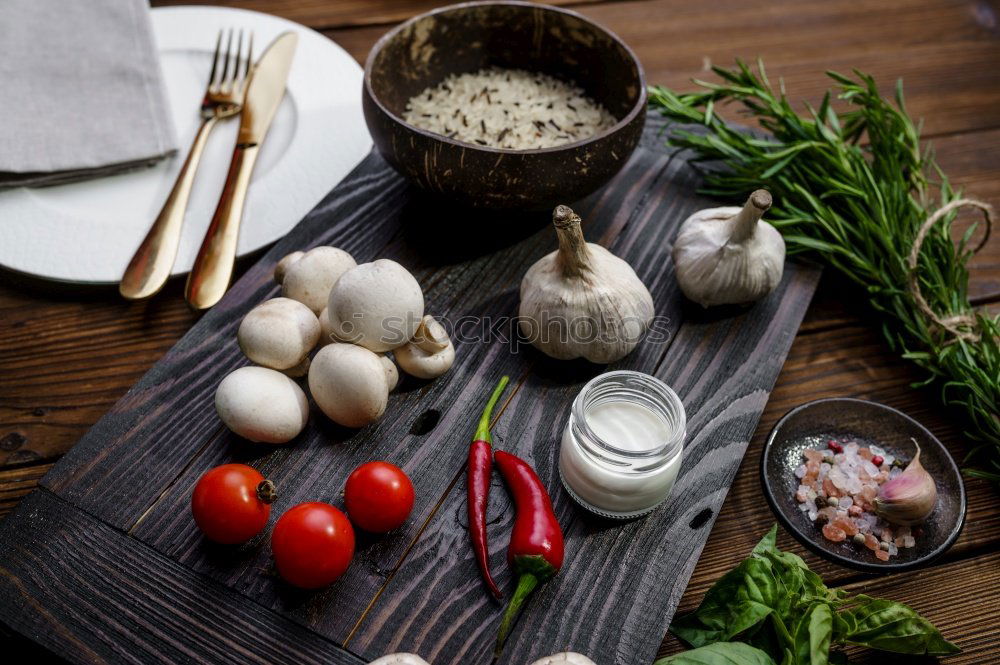 Similar – Image, Stock Photo Asian food concept with homemade dumplings on plates and in steamer, fine shiitake, traditional sauces and crockery. White kitchen cloth on grey concrete background. Top view