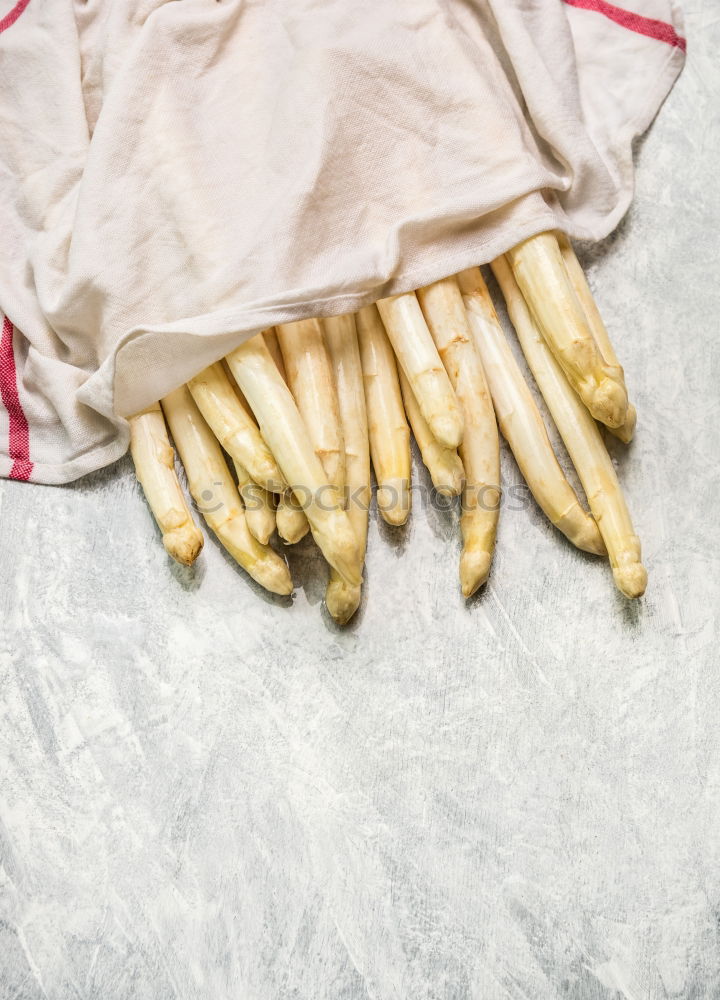 Similar – Asparagus in a wet kitchen towel