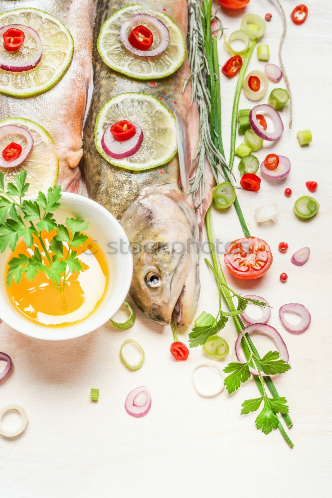 Similar – Image, Stock Photo Fresh char with ingredients for fish dishes