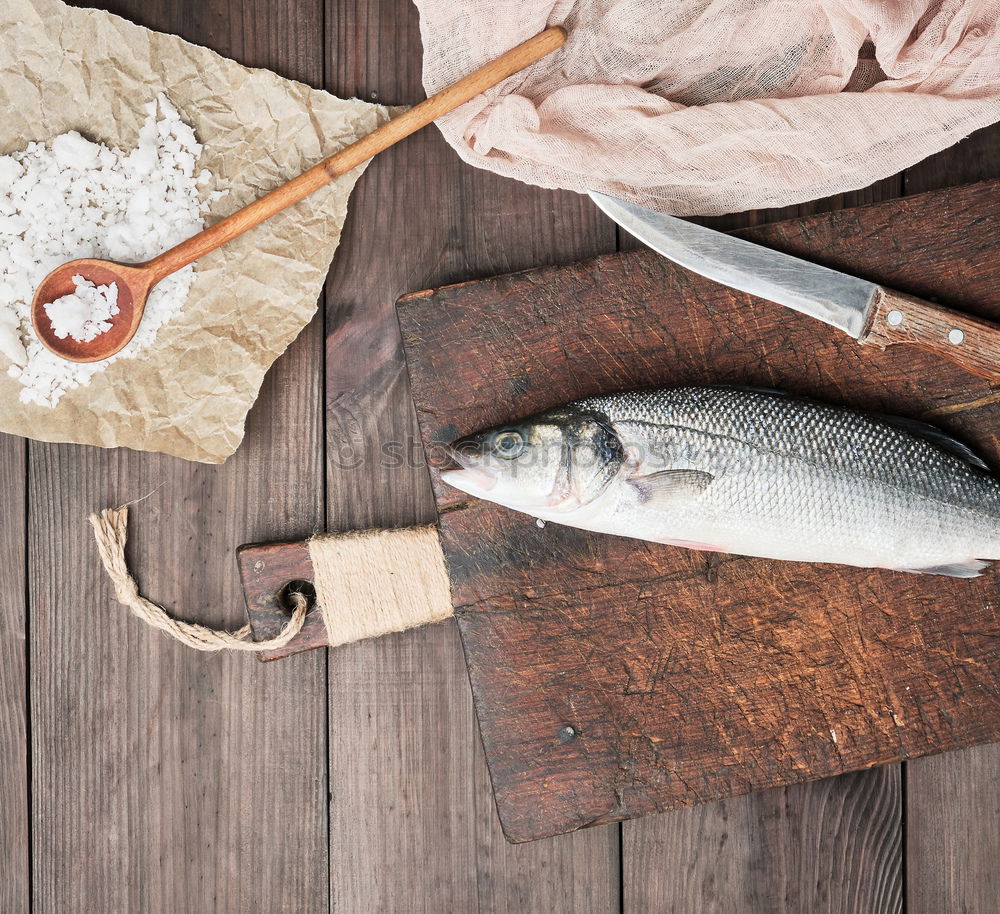 Image, Stock Photo Raw salmon fish in ice and vegetables
