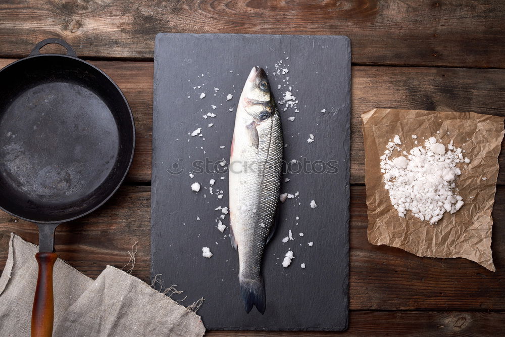 Image, Stock Photo sea bass fish on brown crumpled paper