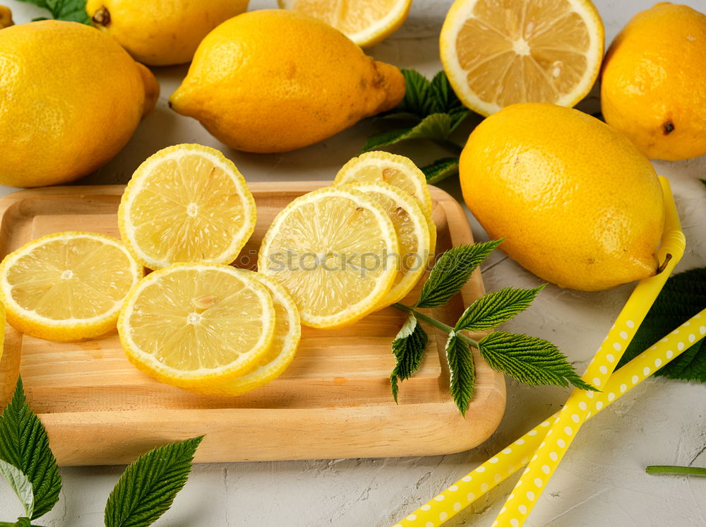 Similar – Image, Stock Photo ripe yellow lemons and lime, mint green